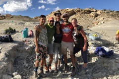 A happy crew of NCSU graduate students Haviv Avrahami, Jens Kosch, Evan Jevnikar, NCSU alumna Alison Moyer, Dr. Zanno, and Dr. Tucker stand in the quarry at the end of the field season.