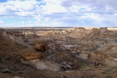 BIO 325 students hiking their way through the stunning badlands of the Menefee Formation in New Mexico.